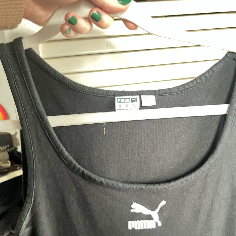 Sporty black mini dress by PUMA with mesh waist detail